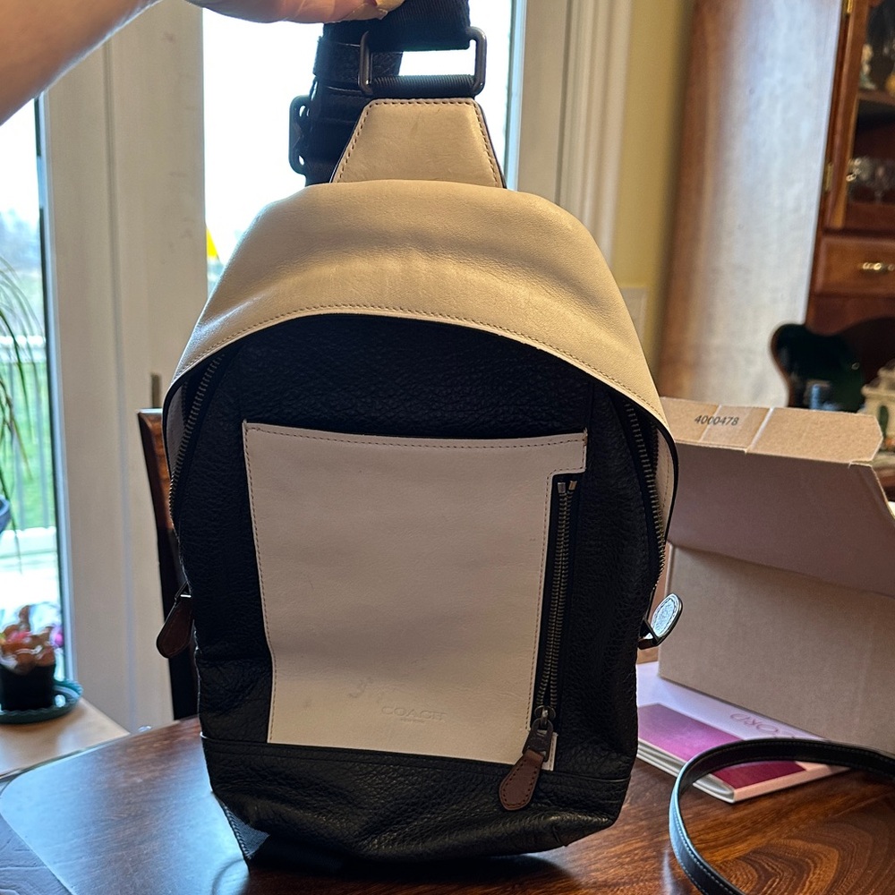 COACH sling bag. Authentic. Black and off white. 
Lightly used.